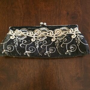 Elegant Black and Cream Clutch